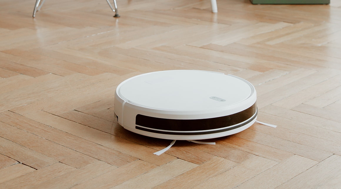 Robotstofzuiger met dweil